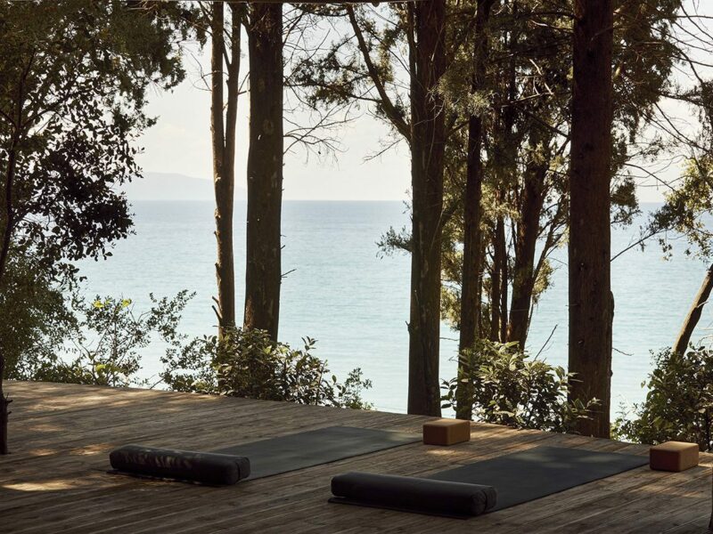 mattresses on wooden floor at a yoga retreat in Greece