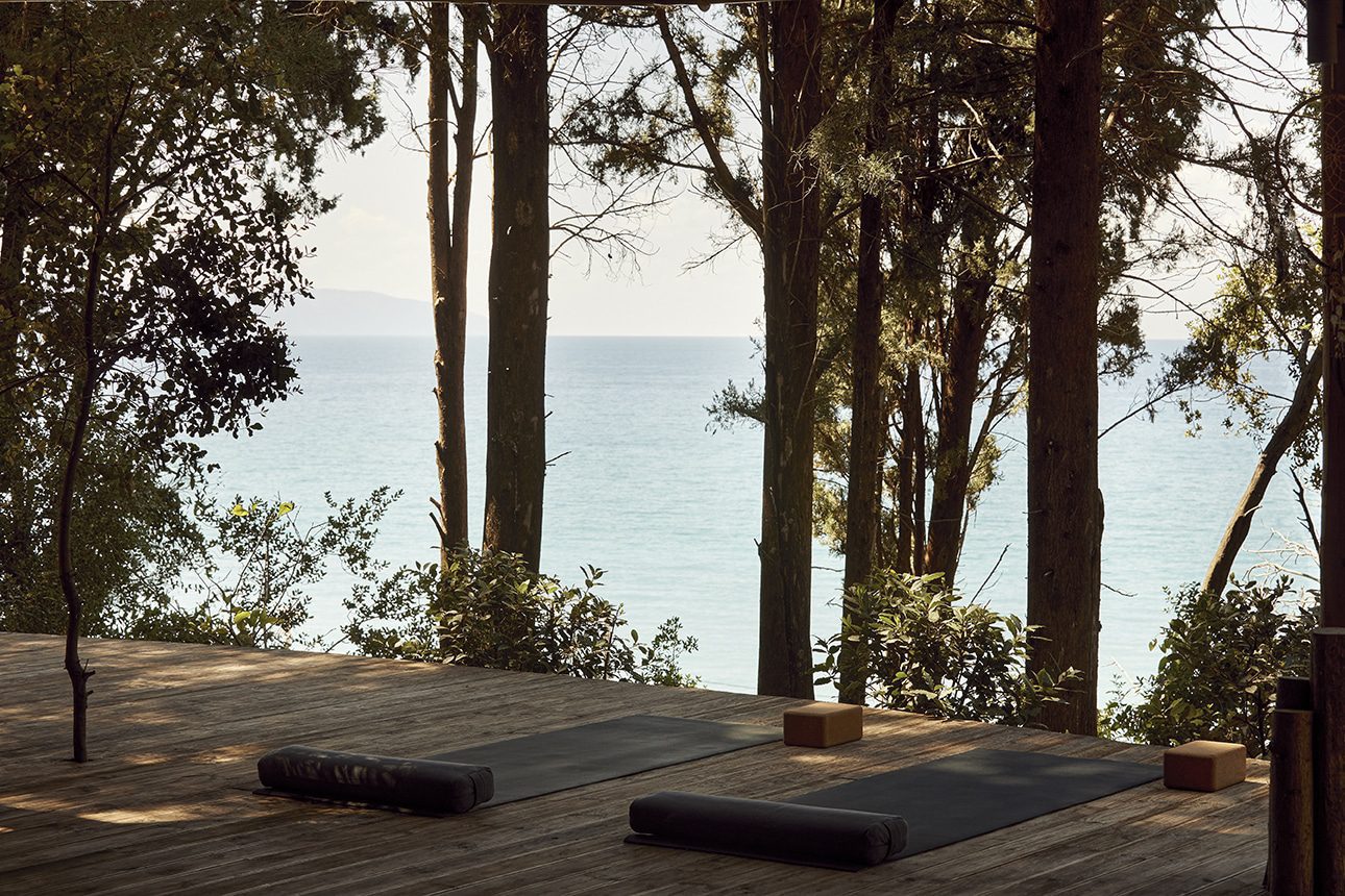 mattresses on wooden floor at a yoga retreat in Greece