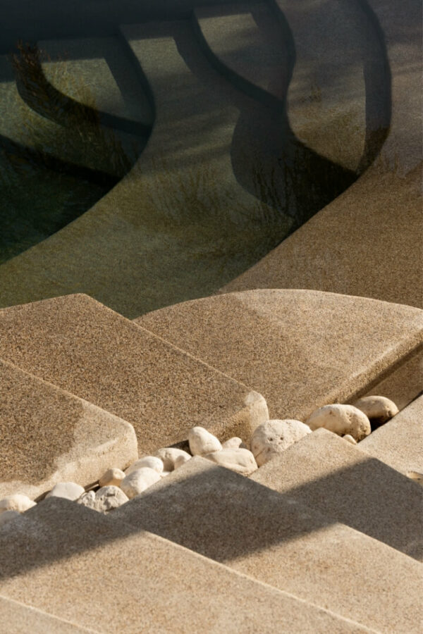 stoned stairs of a rooftop pool on a hotel in Athens