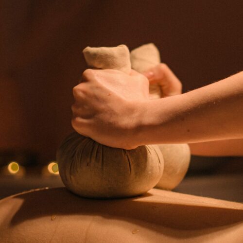 therapist doing a massage on a wellness spa hotel in Athens