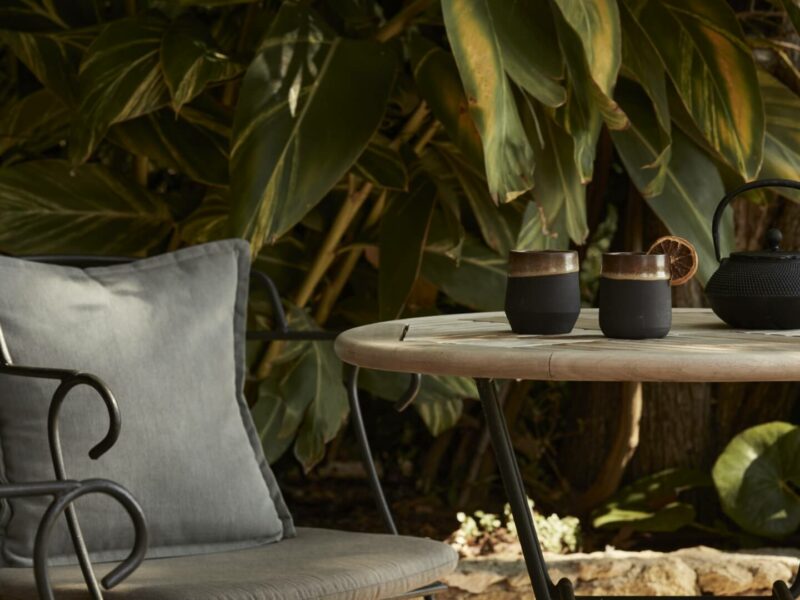 chair and table with tea