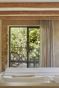 luxury bedroom design with balcony at kefalonia retreat