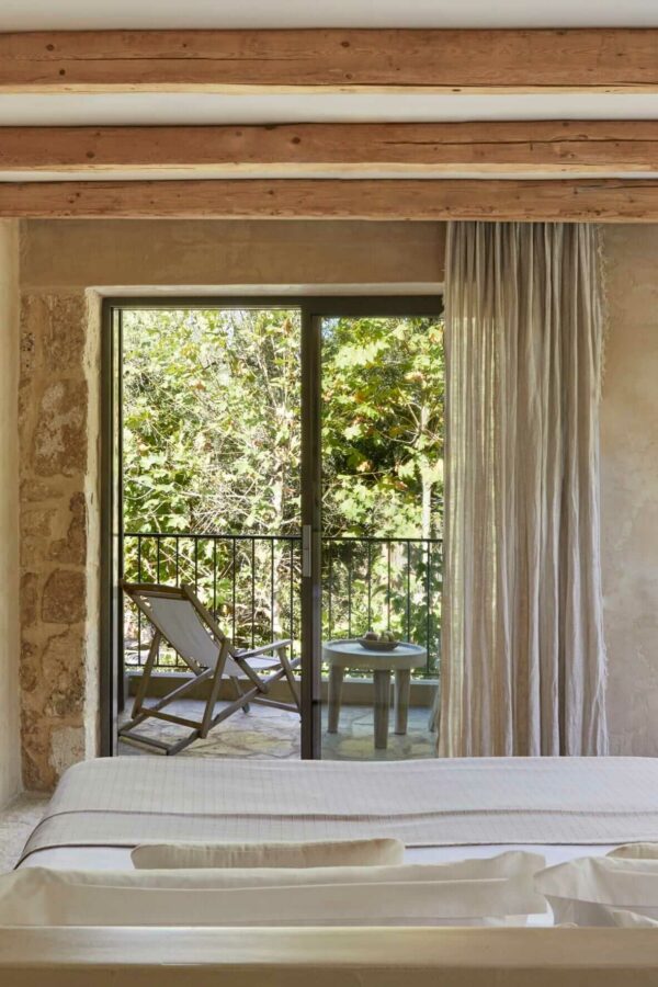 luxury bedroom design with balcony at kefalonia retreat