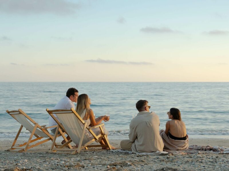 two couples enjoying the beach