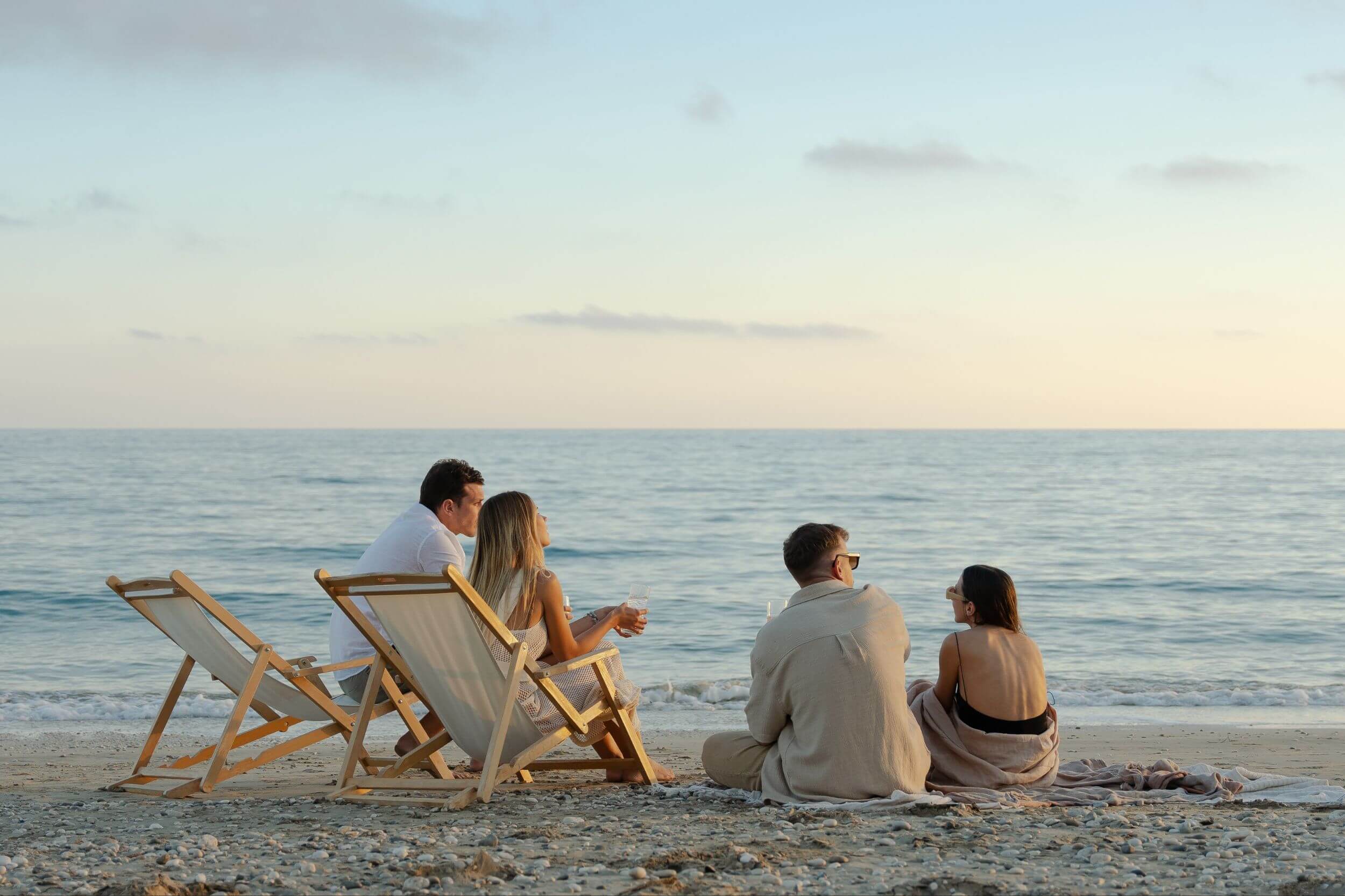 two couples enjoying the beach