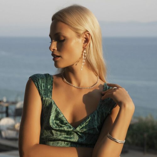 woman wearing greek designer jewellery
