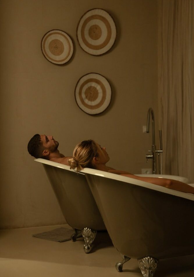 two people enjoying a bath