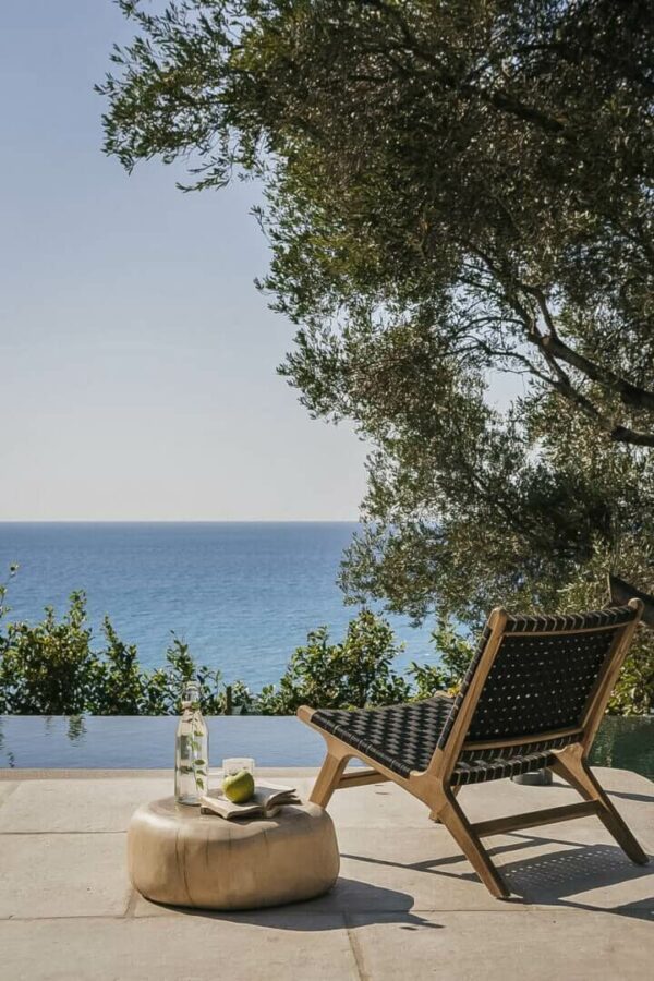 chair by a private pool with sea view