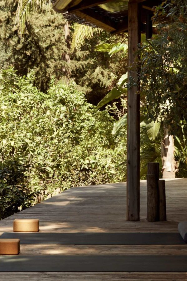 yoga mattresses on a wooden patio