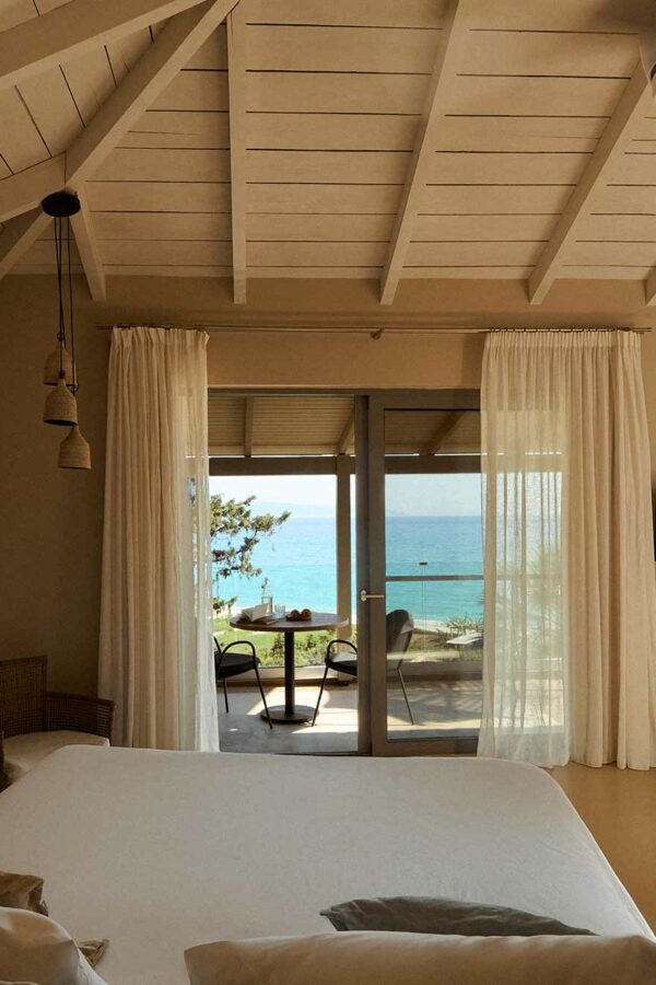 interior of room opening to outside balcony of luxurious room