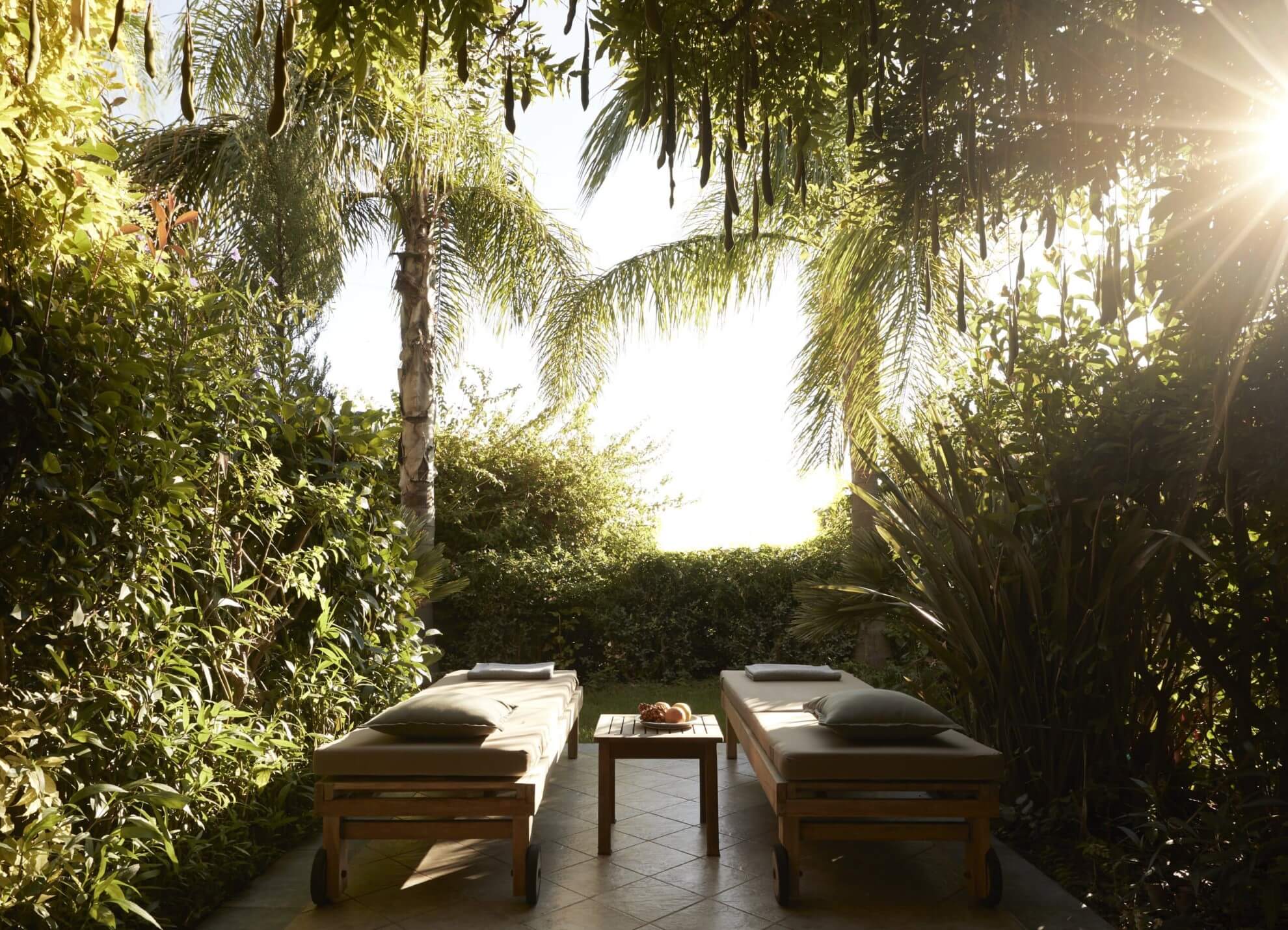 two sunbeds on a patio