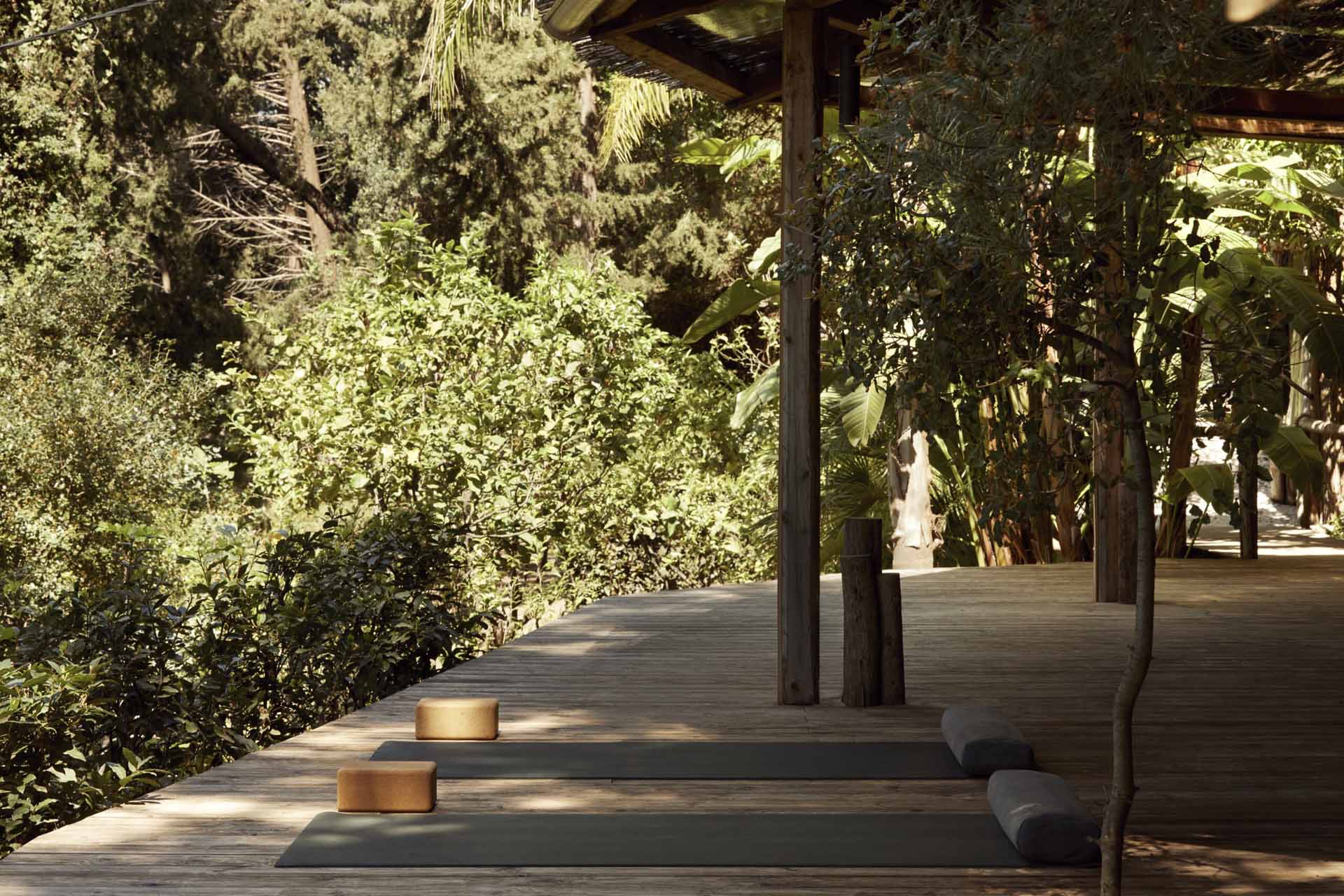 yoga mattresses in a wooden patio