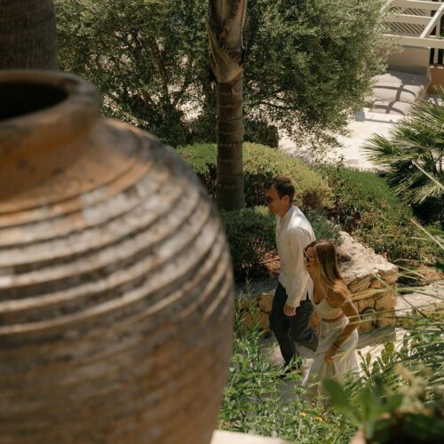 a couple walking stairs on a wellness retreat