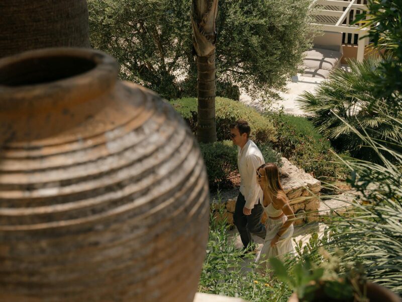 a couple walking stairs on a wellness retreat