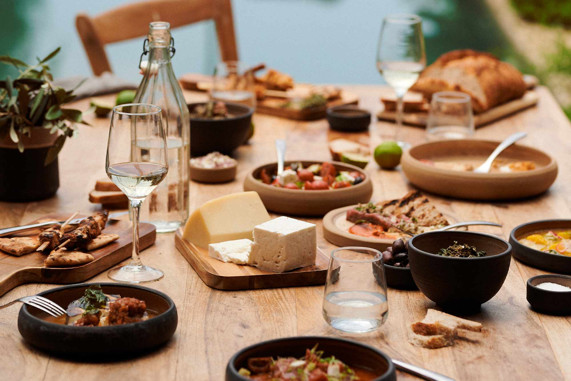 table full of different luxurious dishes