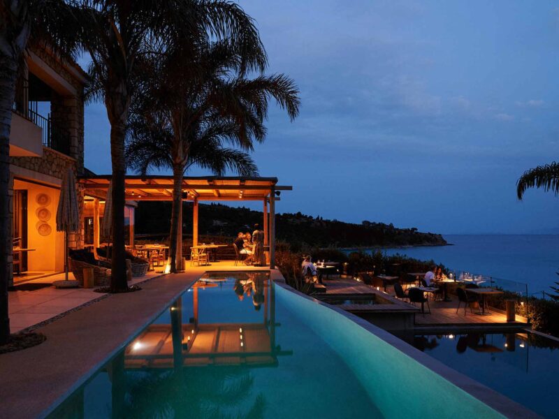 night view of swimming pool and sea F ZEEN KEFALONIA