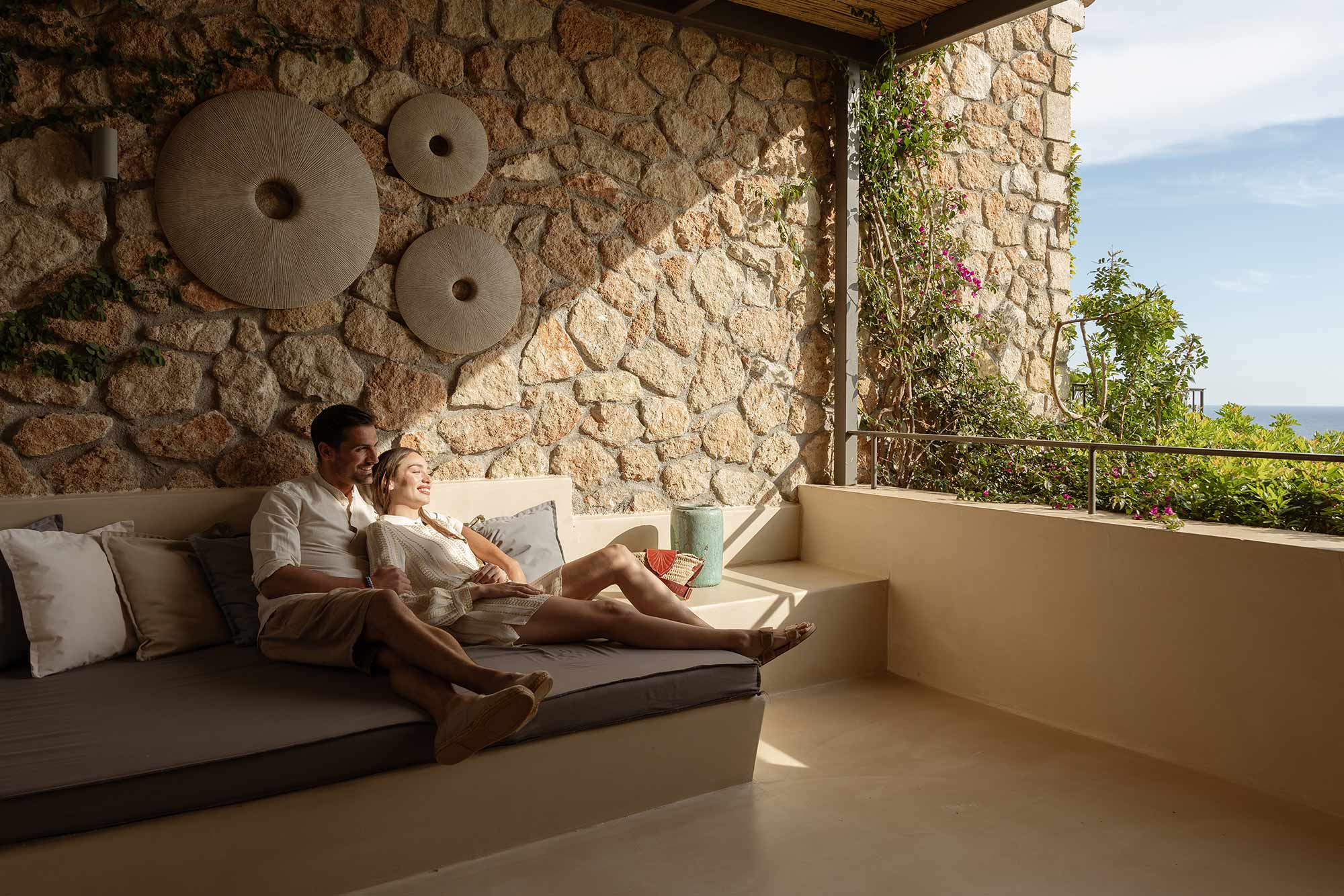 Couple relaxing on sofa